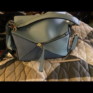 Puzzle bag look shoulder bag